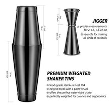  Koviti 12 piece bartender kit stainless steel cocktail shaker set premium bar set for home, bars, parties, and traveling in black - shaker and jigger close up Danielle Walker